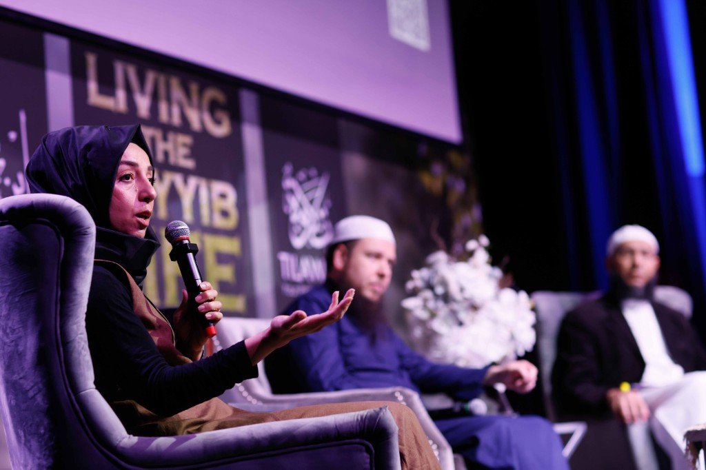 Panel discussion during Living the Tayyib Life with speakers seated on stage