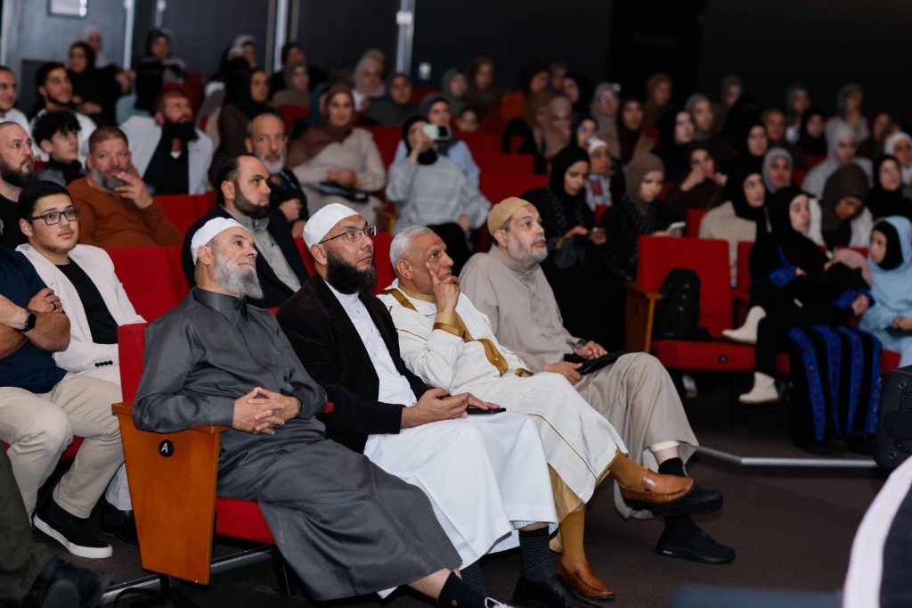 Attentive audience seated during the evening program